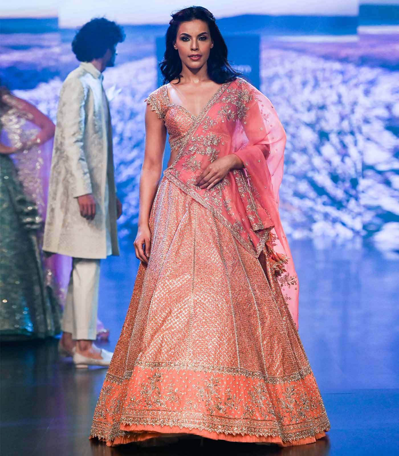 Nissa orange lehnga set